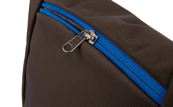 Close shot of the rear compartment zipper.